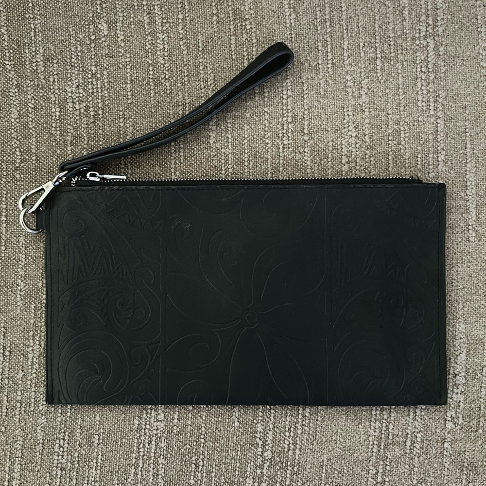 Happy wahine wristlet black embossed medium sized mint